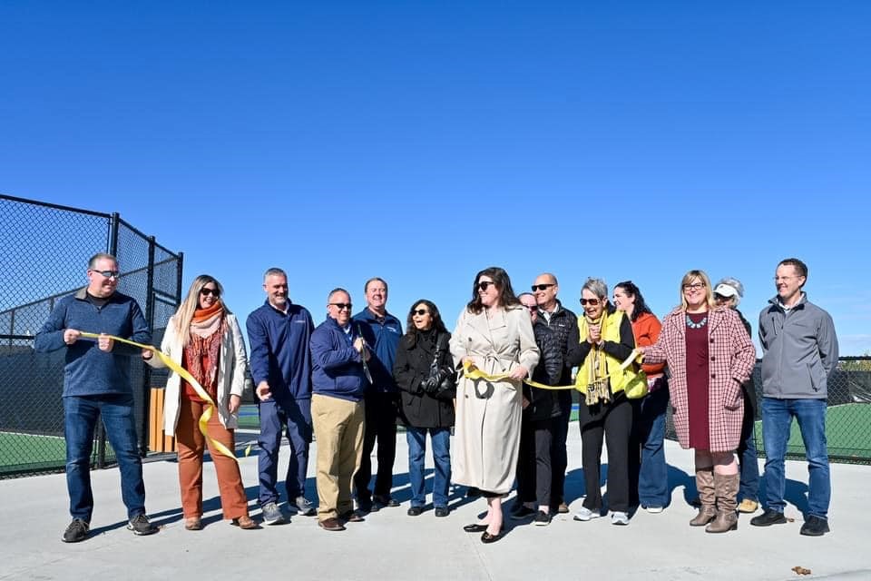 Group photo of City Council, Mayor and Staff at Ribbon cutting for new tennis and pickleball courts
