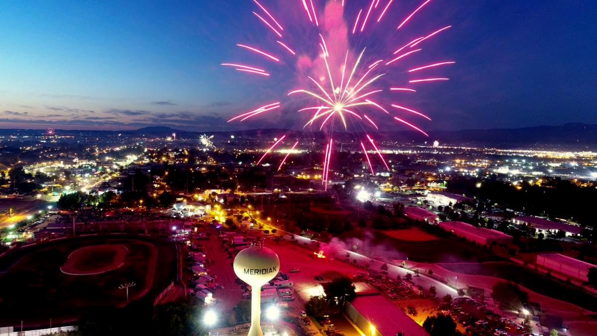 Professional fireworks display over the Meridian Watertower.